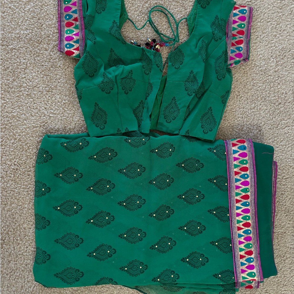 Elegant Green Saree with Embroidered Border